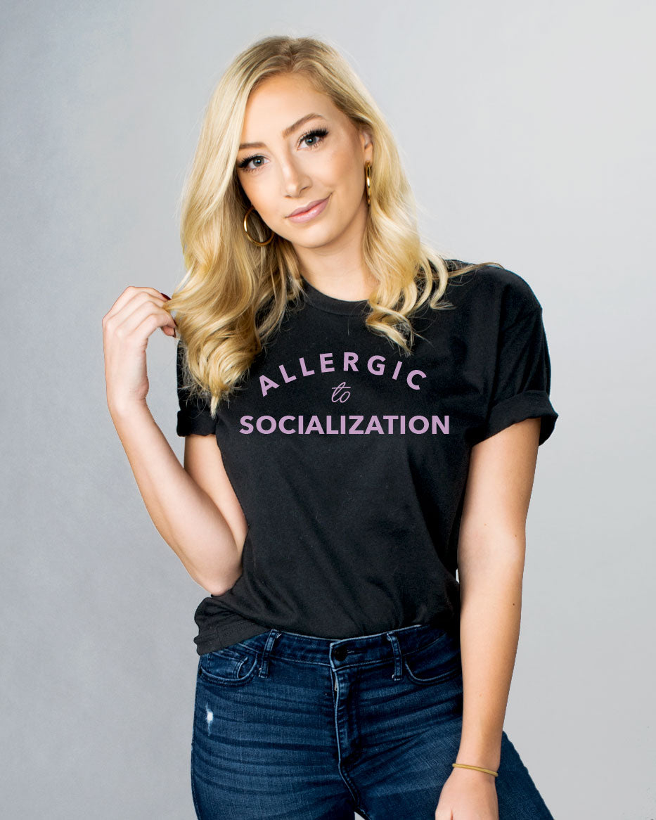Allergic To Socialization Shirt - Femfetti - A black unisex fit graphic tee featuring the phrase &quot;Allergic to Socialization&quot; in purple text.