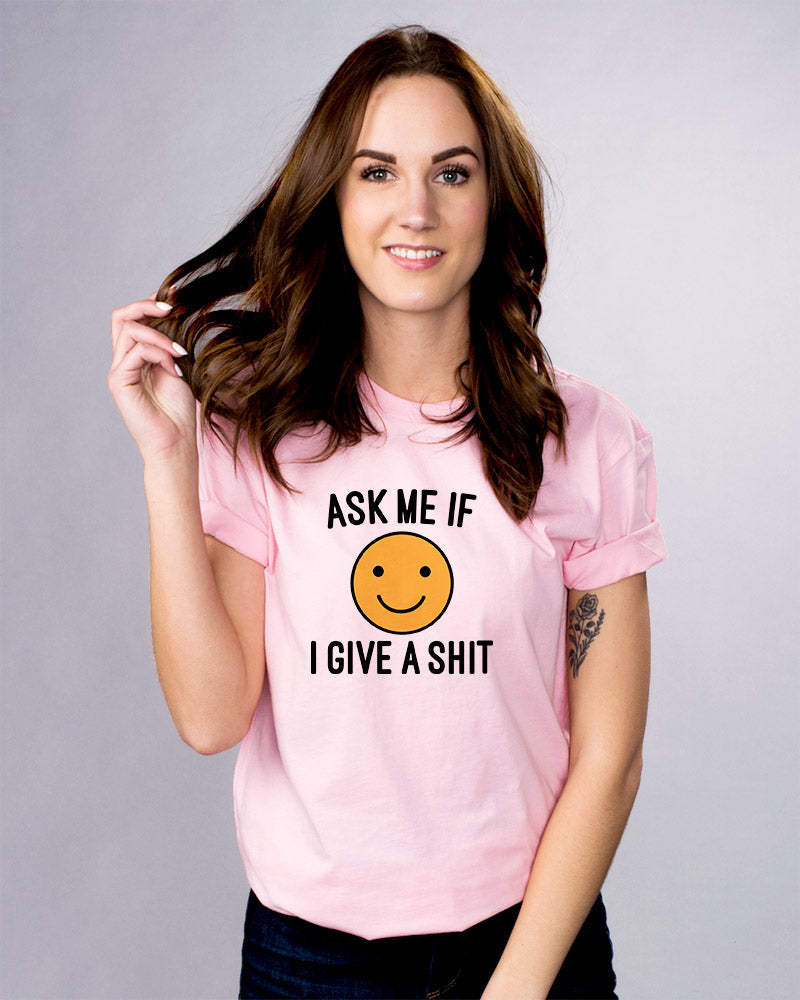 Ask Me if I Give Shirt - Femfetti - A pink unisex fit graphic tee featuring the phrase &quot;Ask me if I give a shit&quot; with a smiley face.