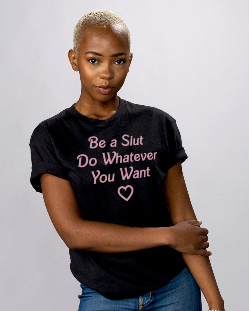 Be A Slut Shirt - Femfetti - A black unisex fit graphic tee featuring the phrase &quot;Be A Slut Do Whatever You Want&quot; in pink text.