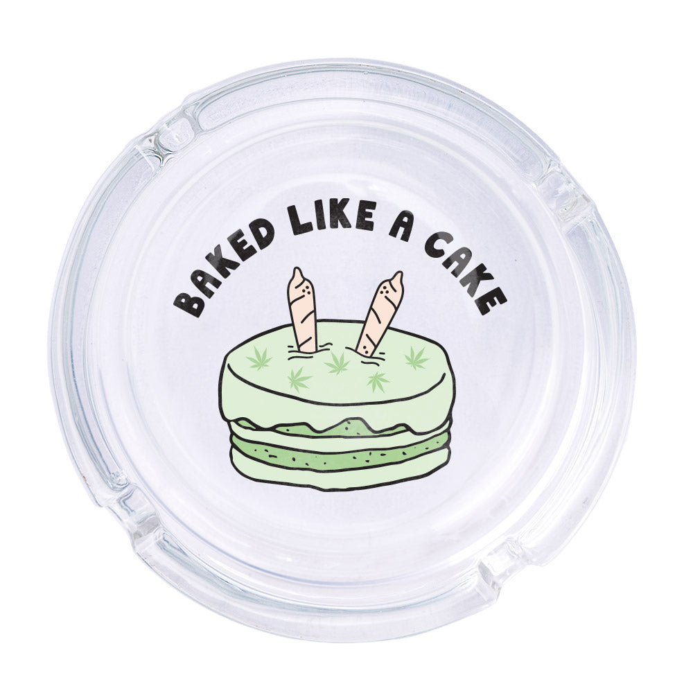 Baked Like A Cake Ashtray - Femfetti - A clear glass ashtray featuring the phrase &quot;Baked like a cake&quot; with the image of a cake with marijuana leaves.