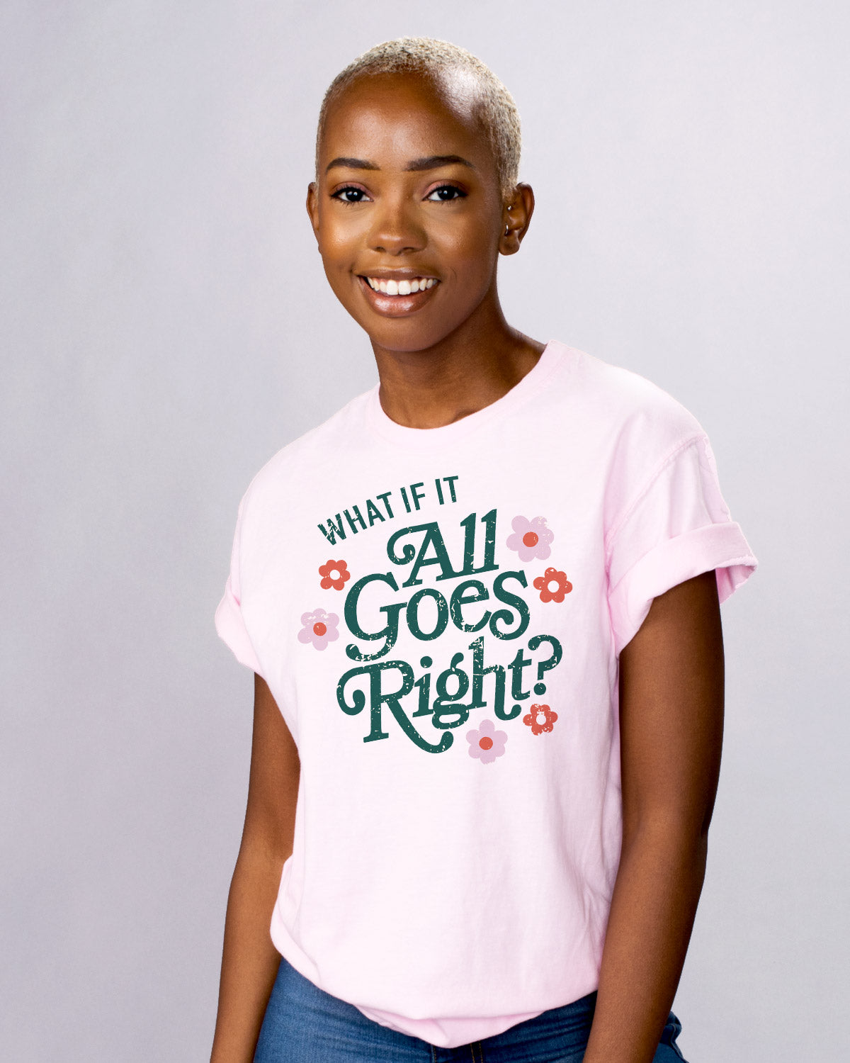 All Goes Right - Femfetti - A Pink color unisex graphic tee with the phrase &quot;What if it all goes right&quot; surrounded by flowers.