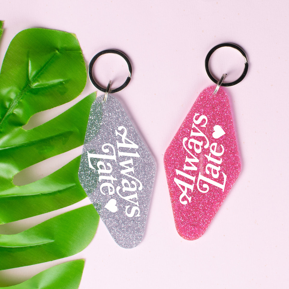 Always Late Keychain - Femfetti - Glitter acrylic motel style keychains in pink and silver featuring the phrase &quot;always late&quot;.