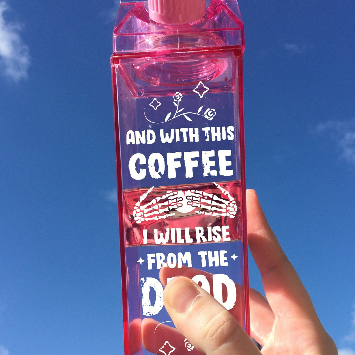 And With This Coffee Milk Carton Water Bottle - Femfetti - A pink milk carton shaped water bottle with the phrase &quot;And with this coffee I will rise from the dead&quot; in white text.