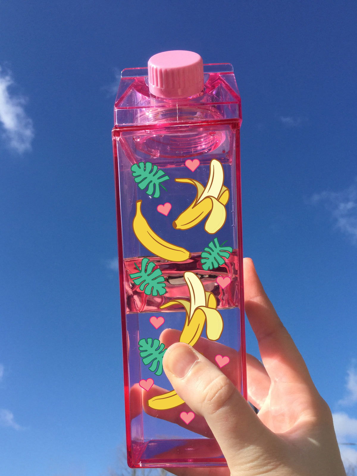 Banana Pattern Milk Carton - Femfetti - A pink acrylic water bottle shaped like a milk carton featuring a pattern of bananas.