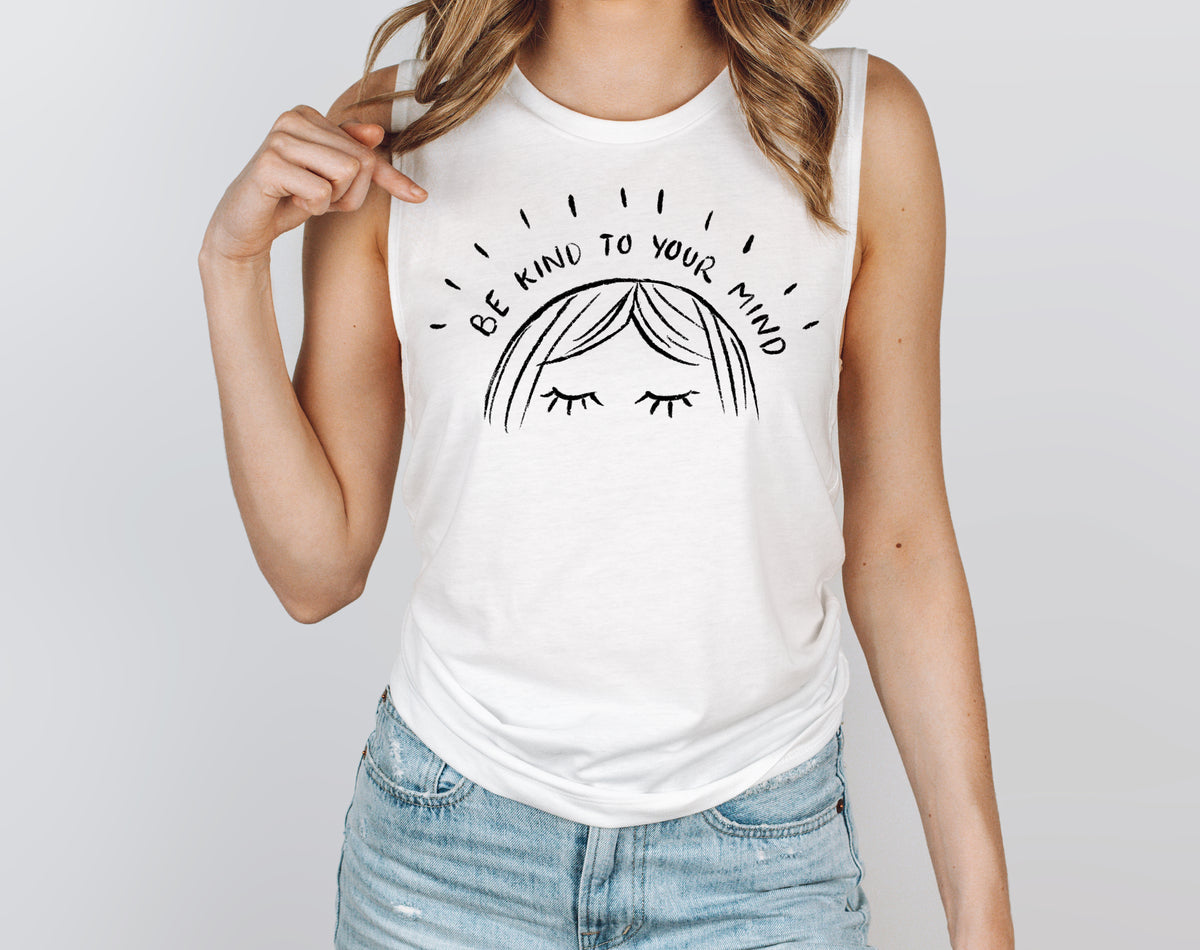 Be Kind To Your Mind Muscle Tank - Femfetti - A white  graphic women&#39;s muscle tank with the phrase &quot;Be Kind To Your Mind&quot;.