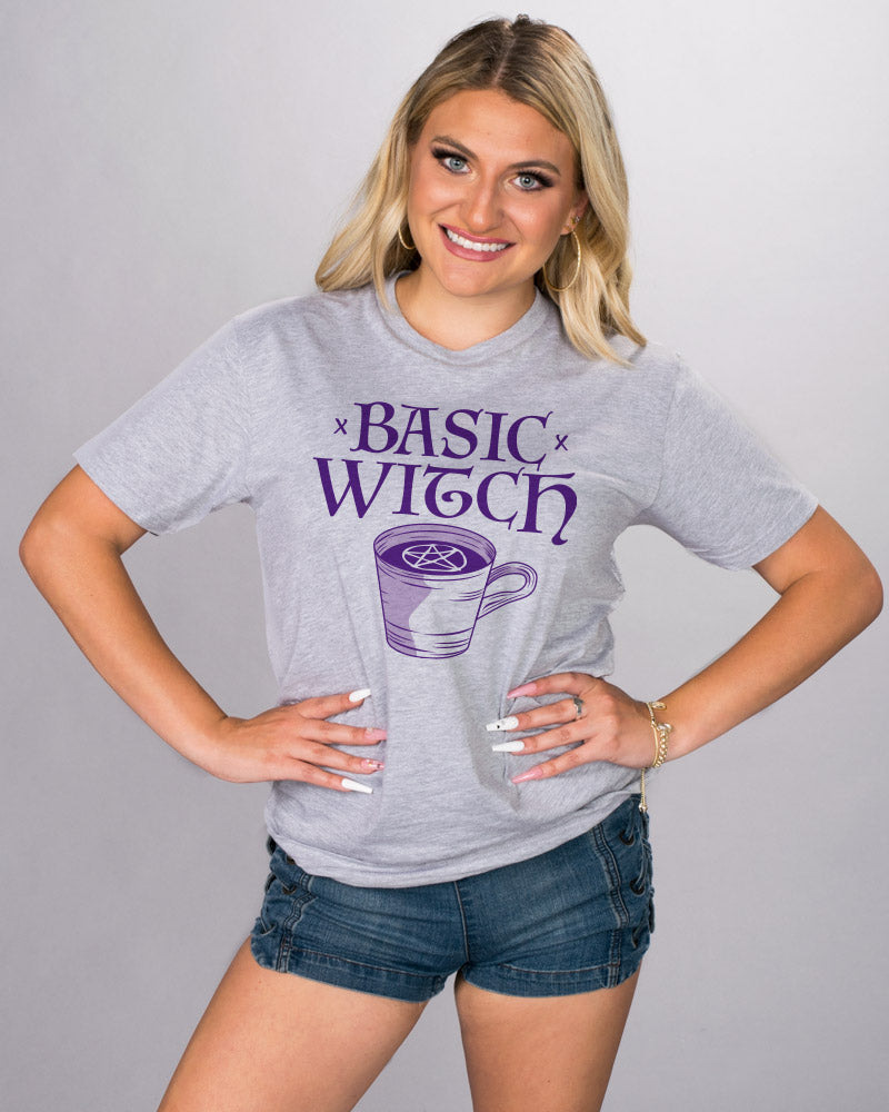 Basic Witch Shirt - Femfetti - A heather gray unisex fit graphic tee featuring the phrase &quot;Basic Witch&quot; in purple text.